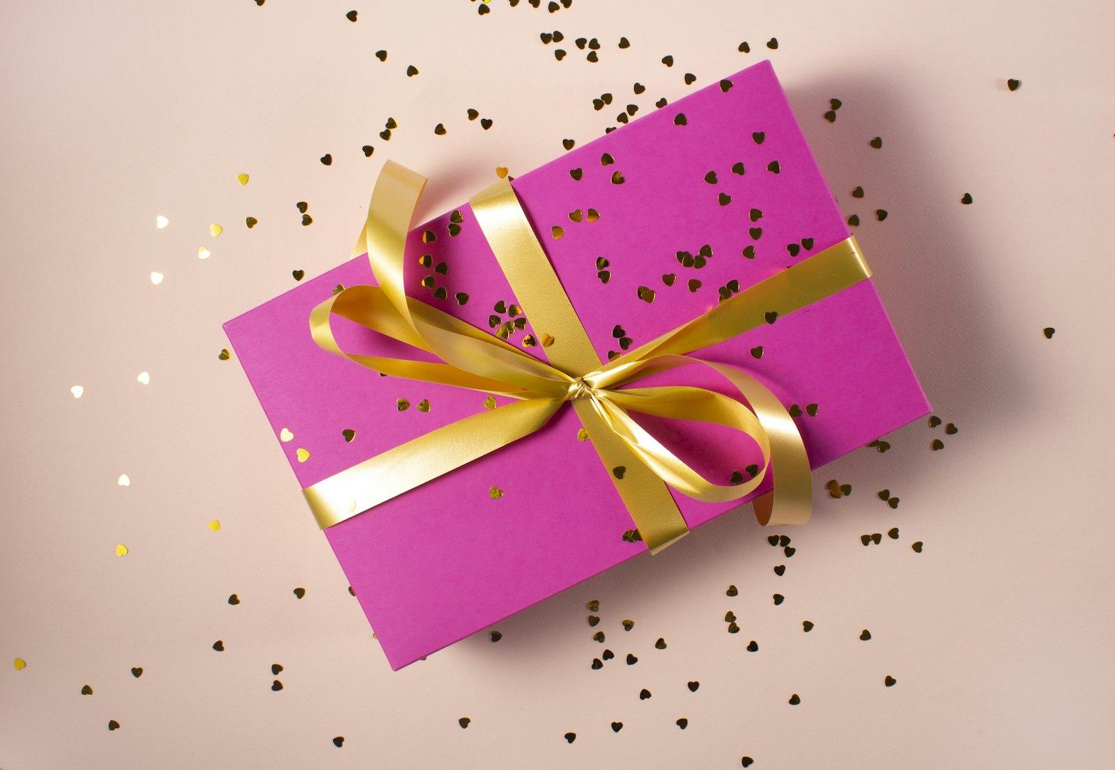 Gift boxes and ribbons on a festive table